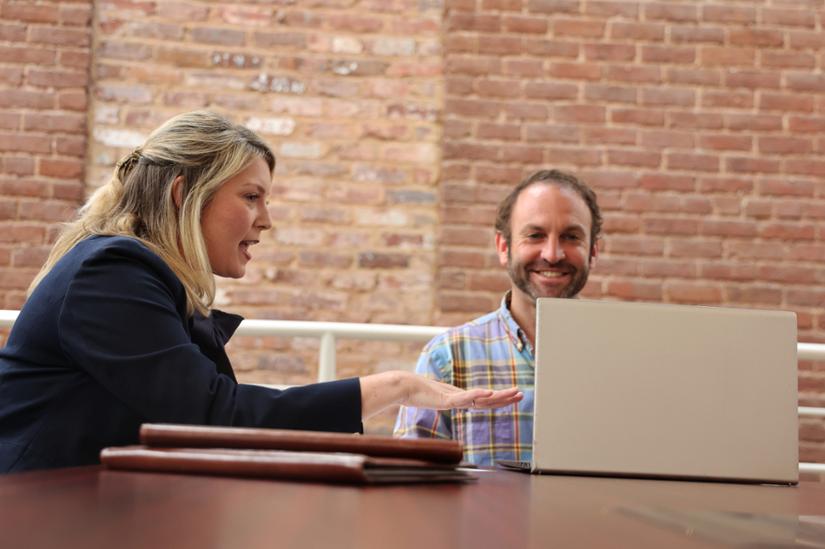 Career services member providing advice to a student